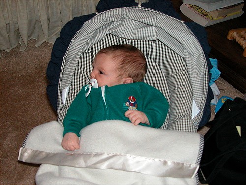 Aiden in his little green outfit