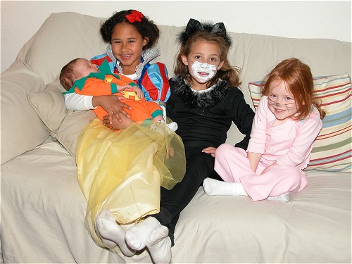 Kylie holds Aiden. L-R: Aiden, Kylie, Ramee and Mila